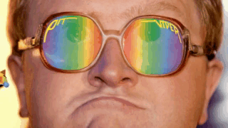 A Man Wearing A Pair Of Viper Sunglasses Is Making A Face GIF