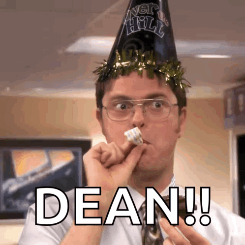 A Man Wearing A Party Hat Says Dean GIF