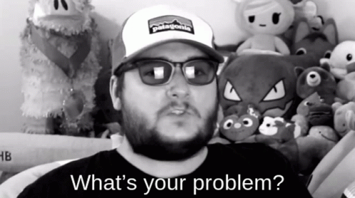 Man In Patagonia Hat Asking What's His Problem GIF