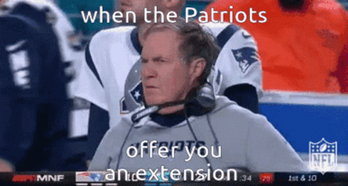 A Man Wearing A Patriots Jersey Is Sitting In The Stands GIF