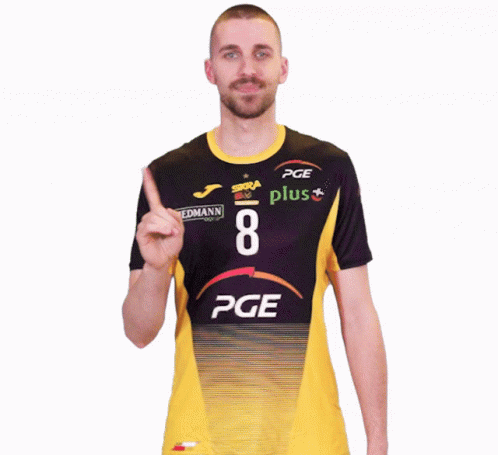 A Man Wearing A Pge Plus Shirt Points Upwards GIF