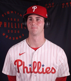 A Man Wearing A Phillies Jersey And Headphones GIF