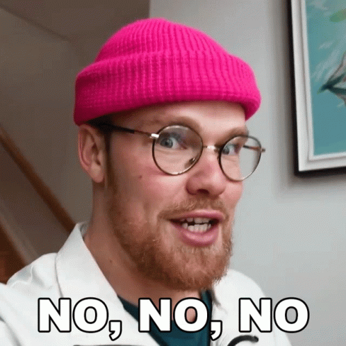 A Man Wearing A Pink Beanie And Glasses Says No GIF