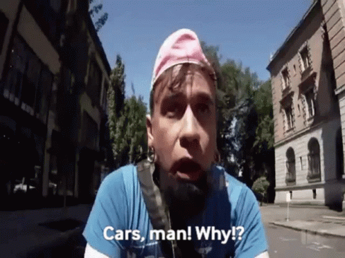 A Man Wearing A Pink Hat And A Blue Shirt Says Cars Man Why ? GIF
