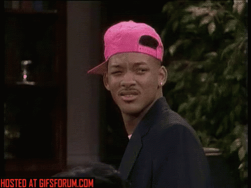 A Man Wearing A Pink Hat Is Hosted At Gifs Forum.com GIF