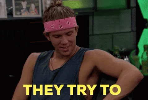 A Man Wearing A Pink Headband And A Blue Tank Top Says They Try To GIF