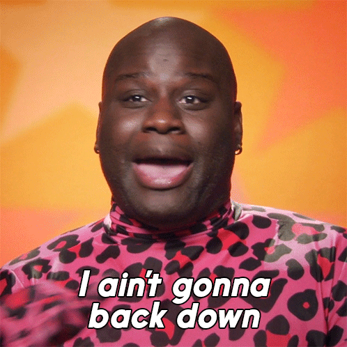 A Man Wearing A Pink Leopard Print Shirt Says I Ain T Gonna Back Down GIF