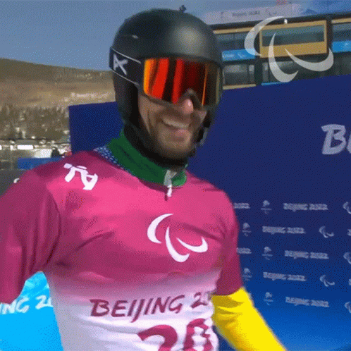 A Man Wearing A Pink Shirt That Says Beijing GIF