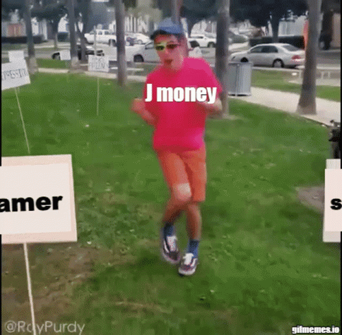 A Man Wearing A Pink Shirt That Says J Money Is Running In A Park GIF