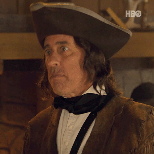 A Man Wearing A Pirate Hat And A Bow Tie With The Hbo Logo In The Corner GIF