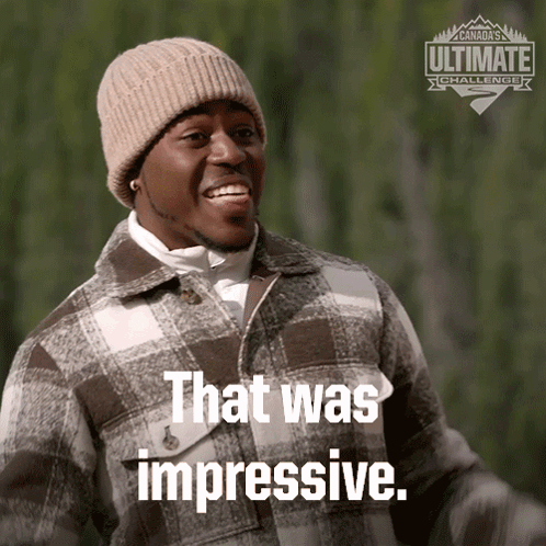 A Man Wearing A Plaid Jacket And A Hat Says That Was Impressive GIF