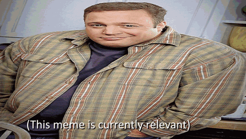 A Man Wearing A Plaid Shirt Is Smiling With The Caption " This Meme Is Currently Relevant " GIF