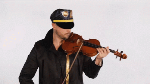 A Man Wearing A Police Hat Plays A Violin GIF