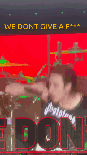 A Man Wearing A Prototypes Jersey Is Singing Into A Microphone . GIF