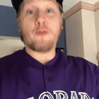 A Man Wearing A Purple Colorado Jersey Looks Surprised GIF