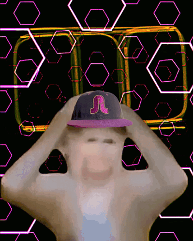 A Man Wearing A Purple Hat With A Letter R On It GIF