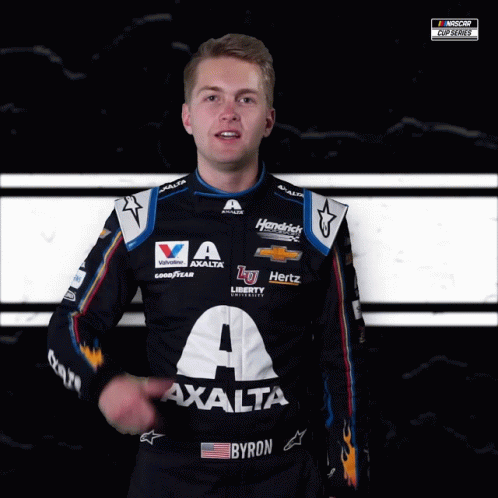 A Man Wearing A Racing Suit That Says Byron On It GIF