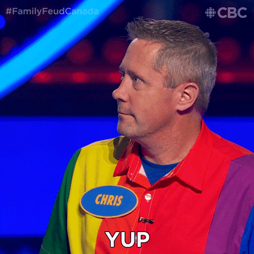 A Man Wearing A Rainbow Shirt Has A Name Tag That Says Chris GIF