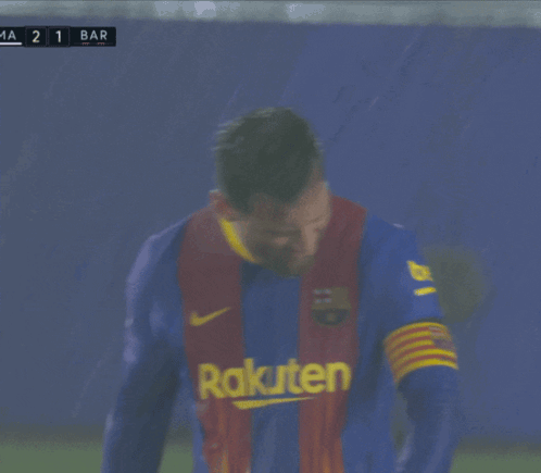 A Man Wearing A Rakuten Jersey Is Laughing GIF