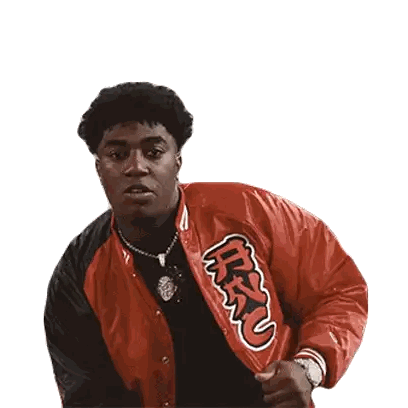 a man wearing a red and black jacket with the letter u on it .