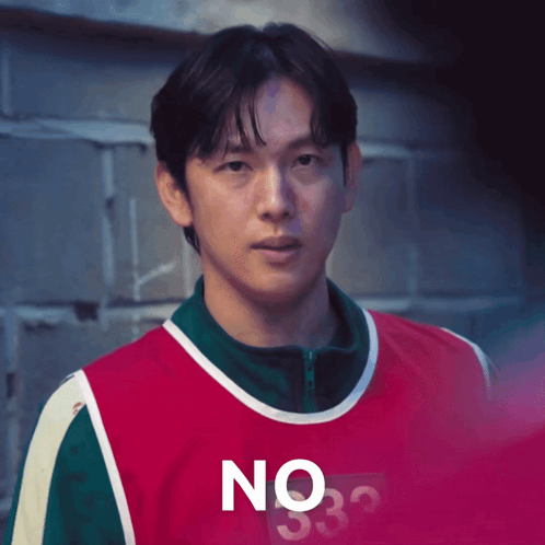A Man Wearing A Red And Green Shirt With The Number 332 On It GIF