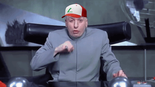 A Man Wearing A Red And White Hat With A Green Letter L On It GIF