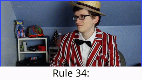 A Man Wearing A Red And White Striped Jacket And A Straw Hat With Rule 34 Written On The Bottom GIF