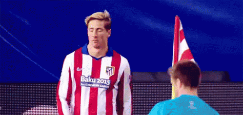 A Man Wearing A Red And White Striped Shirt With Baku 2015 On It GIF