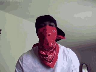 A Man Wearing A Red Bandana And A Hat GIF