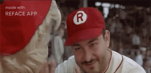 Man In Red Baseball Cap Smiling At Woman GIF