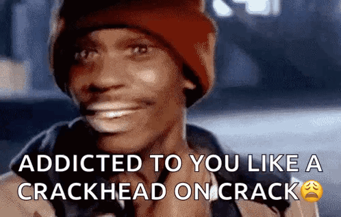 A Man Wearing A Red Beanie Is Smiling With The Words Addicted To You Like A Crackhead On Crack GIF