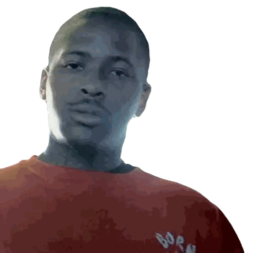 a man wearing a red born t-shirt looks at the camera