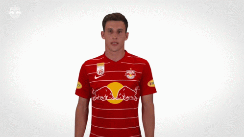 A Man Wearing A Red Bulls Jersey With The Number One On It GIF