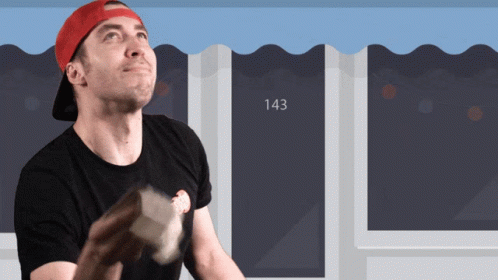 A Man Wearing A Red Hat And A Black Shirt Stands In Front Of The Number 143 GIF