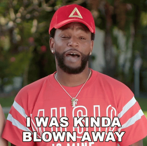 A Man Wearing A Red Hat And A Red Shirt Says I Was Kinda Blown Away GIF