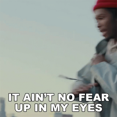 A Man Wearing A Red Hat Is Saying It Ain 'T No Fear Up In My Eyes GIF