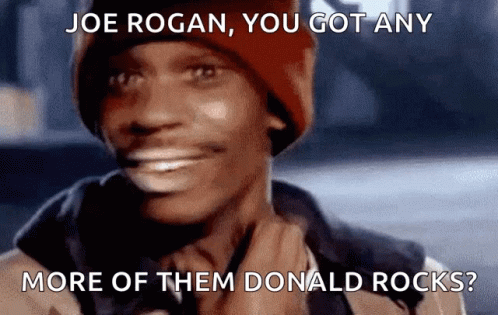 A Man Wearing A Red Hat Is Smiling With The Caption Joe Rogan You Got Any More Of Them Donald Rocks ? GIF