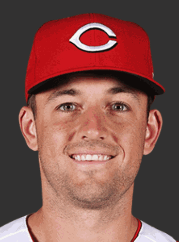 A Man Wearing A Red Hat With The Letter C On It Smiles GIF