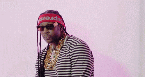 A Man Wearing A Red Headband That Says Supreme On It GIF