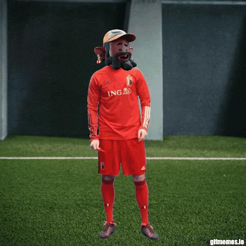 A Man Wearing A Red Ing Jersey Is Dancing On A Soccer Field GIF