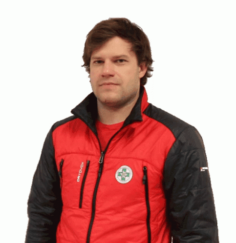 A Man Wearing A Red Jacket That Says Ortovox On The Front GIF