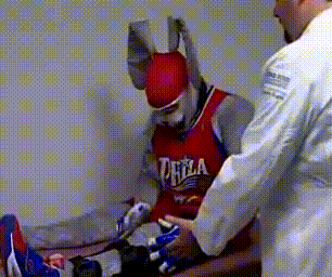 A Man Wearing A Red Jersey That Says Philadelphia On It GIF