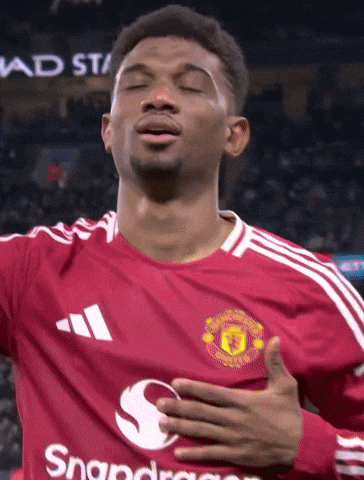 A Man Wearing A Red Jersey With Snapdragon On The Front GIF