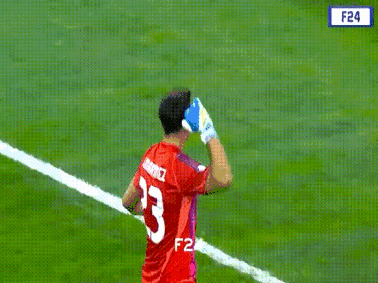 A Man Wearing A Red Jersey With The Number 23 On It GIF