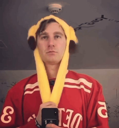 A Man Wearing A Red Jersey With The Number 3 GIF