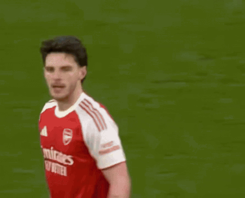 A Man Wearing A Red Jersey With The Number 41 On It GIF