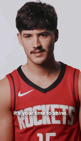 A Man Wearing A Red Rockets Jersey With The Words " It 'S Your Time To Shine " GIF