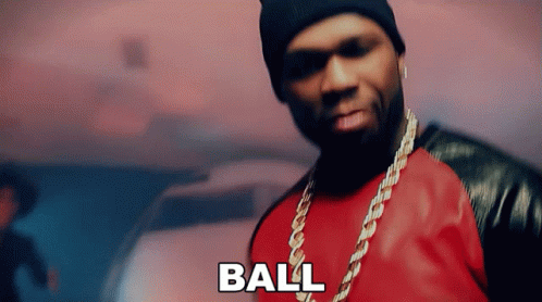 A Man Wearing A Red Shirt And A Black Beanie Says The Word Ball GIF