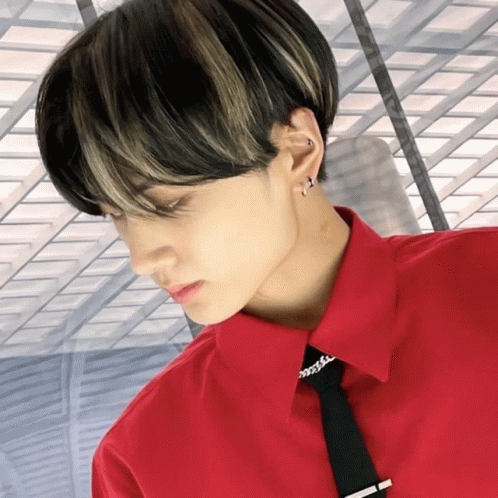 A Man Wearing A Red Shirt And A Black Tie GIF