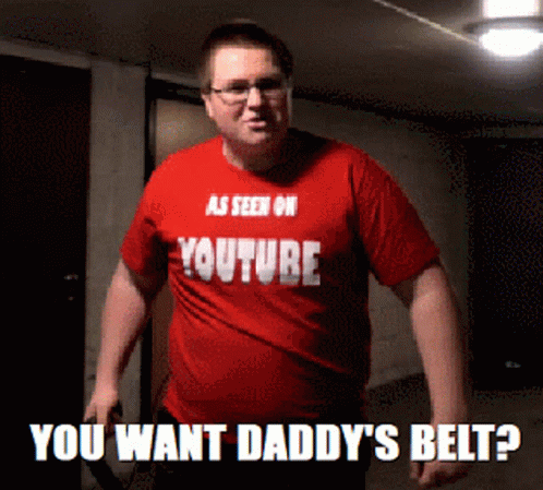 A Man Wearing A Red Shirt That Says " As Seen On Youtube You Want Daddy 'S Belt " GIF